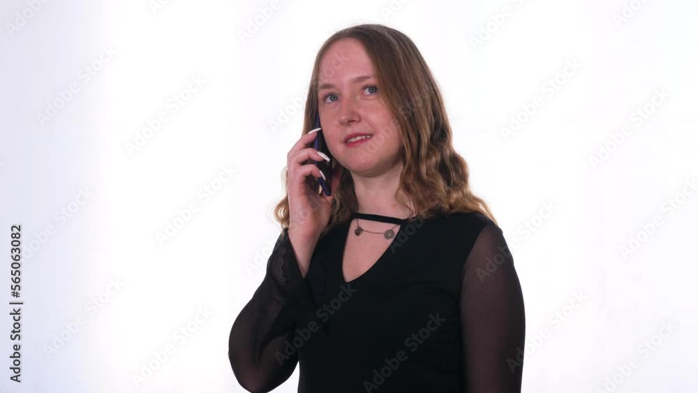 communication, globalization - smiling girl talks on phone with her friend communication, globalization - smiling girl talks on phone with her friend