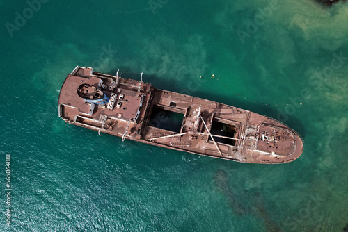 Aerial drone point of view from above to the abandoned ship after shipwreck on the shore between Arrecife and Costa Teguise of Lanzarote Island. Spain. Travel destinations concept © Alex Tihonov