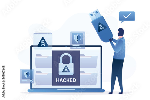 Cyber criminal, concept. Hacked laptop. Hacker anonymous holds usb flash disk with virus. Computer files after hacker attack. Network piracy danger. Ransomware, spam, malware.
