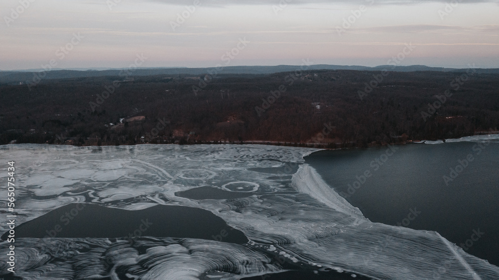 Frozen lake shoreline from a drone