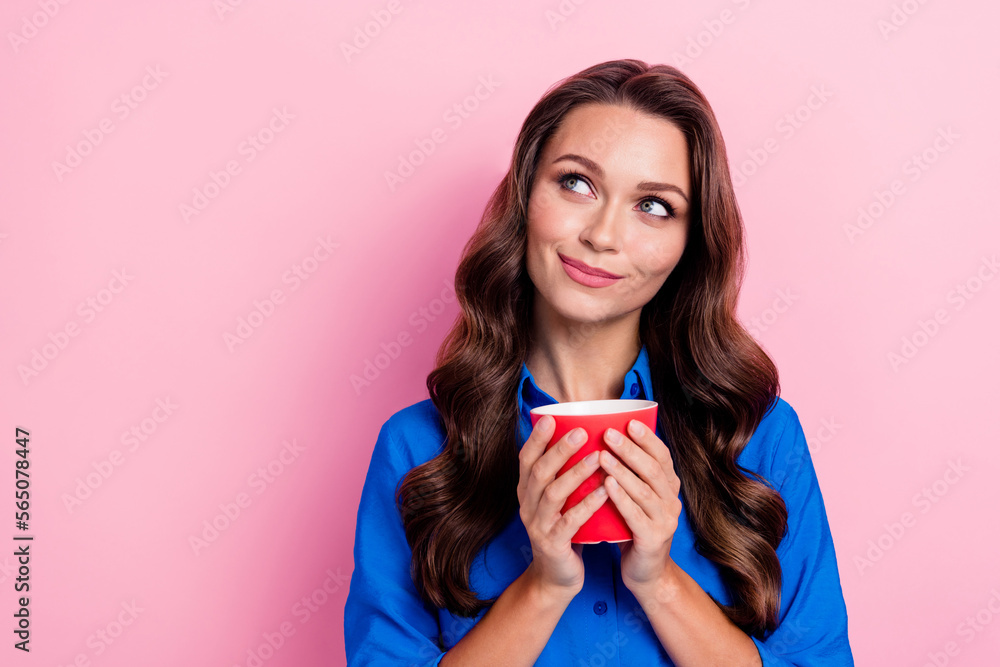 Photo of pretty cute lovely lady wear stylish clothes hold hot delicious tea look empty space offer news isolated on pink color background Photo of pretty cute lovely lady wear stylish clothes hold hot delicious tea look empty space offer news isolated on pink color background