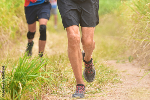 Trail Running In The Light Of Evening, Run On Trekking Trail, Fitness Running On Trail.