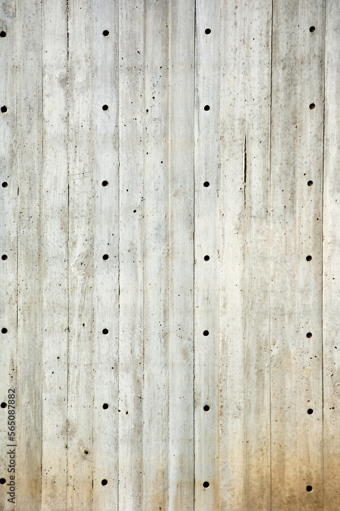 Cement woodgrain wall with holes for texture or background Cement woodgrain wall with holes for texture or background