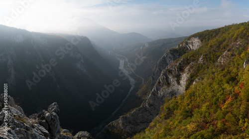 Mountain view down the river canyon during hazy autumn morning, mountain landscape photo