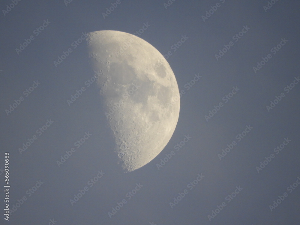 Beautiful moon details on the evening sky Beautiful moon details on the evening sky