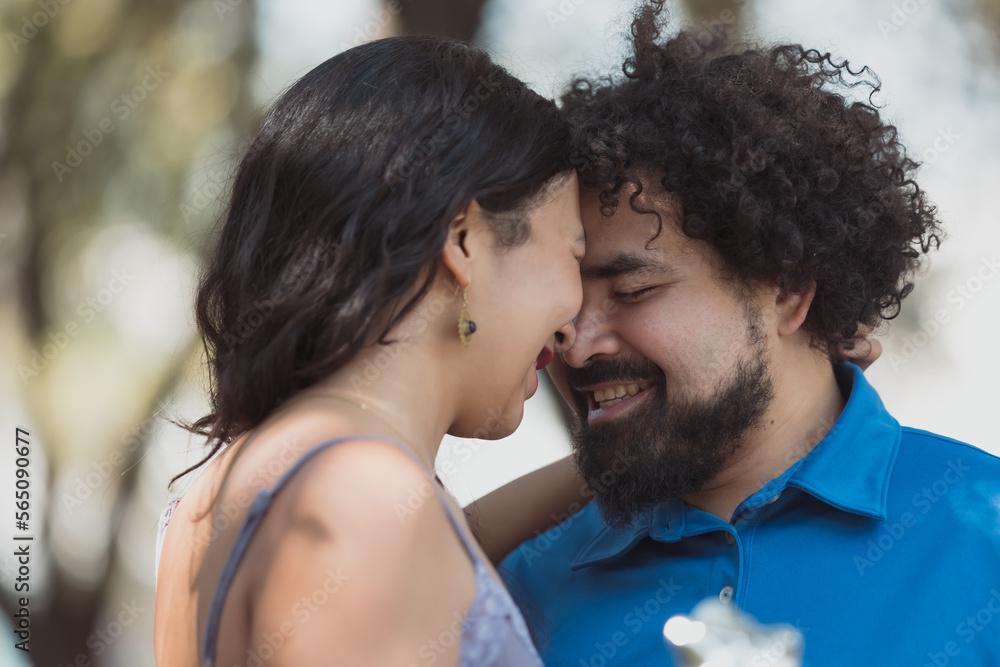 face to face mexican young couple, real love concept face to face mexican young couple, real love concept