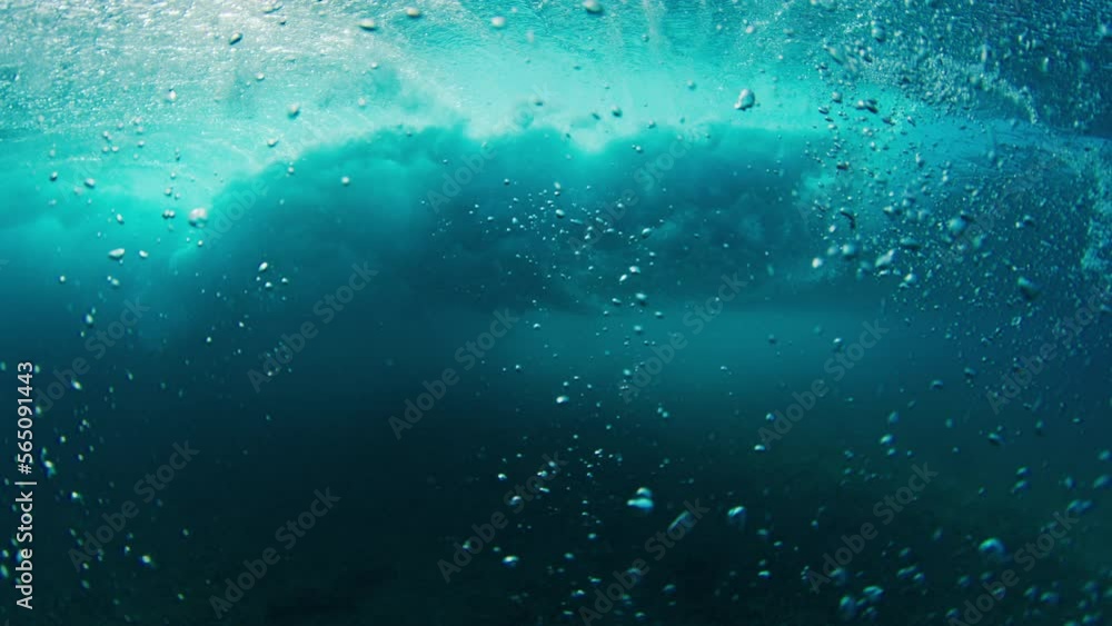Man surfs the ocean wave. Male surfer rides the wave Man surfs the ocean wave. Male surfer rides the wave