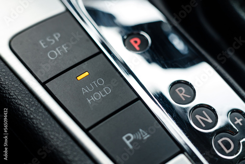 Obraz na płótnie Auto hold button in a modern vehicle turned on w salonie