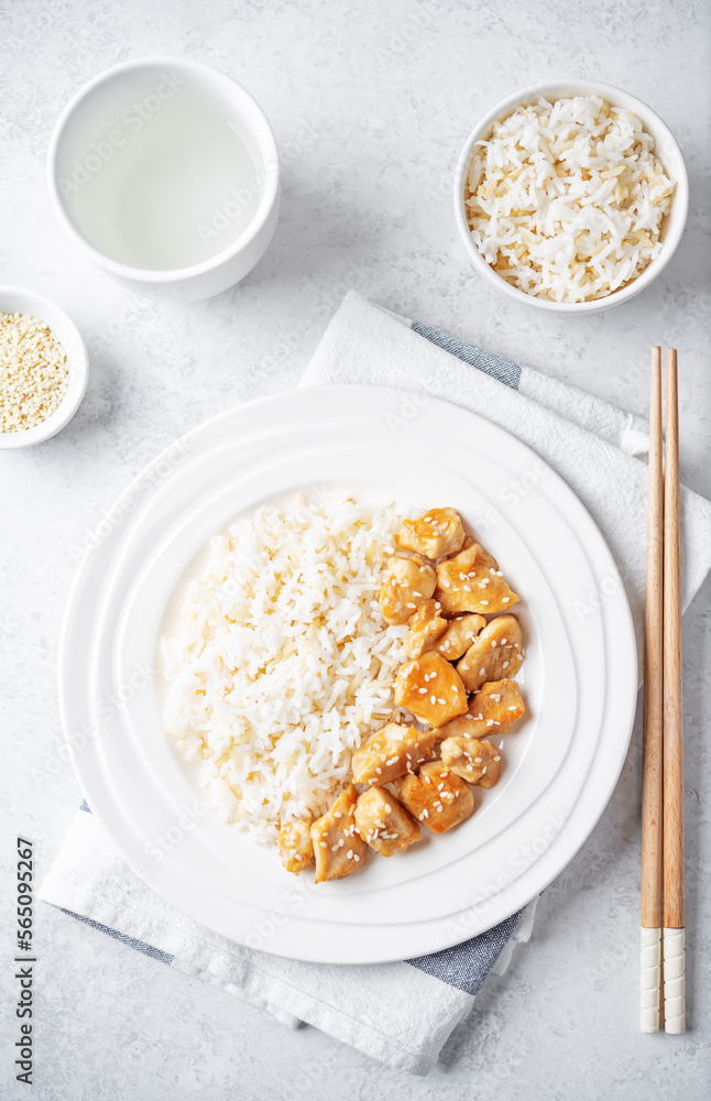 Orange teriyaki chicken with rice in a plate Orange teriyaki chicken with rice in a plate