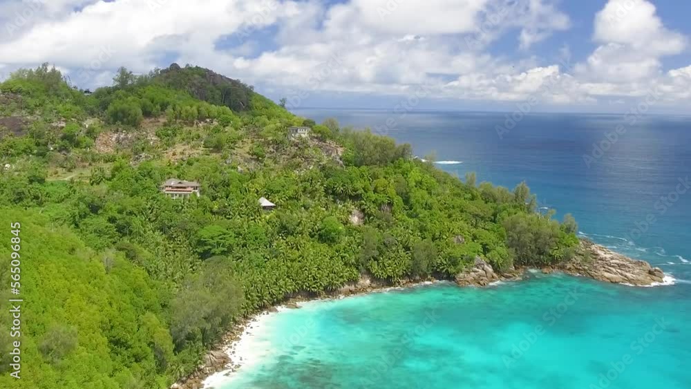 Beautiful aerial view of Seychelles beach and trees from a drone perspective Beautiful aerial view of Seychelles beach and trees from a drone perspective