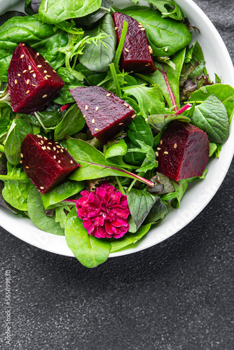 beet salad beetroot pieces mix green lettuce healthy meal food snack on the table copy space food background rustic top view