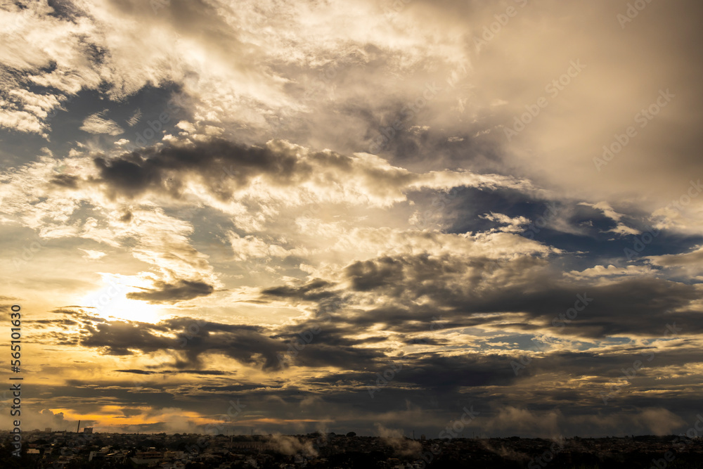 Dramatic sunset in the Sky through cumulus storm clouds, Timelapse. Awesome epic landscape. Amazing vibrant colors, in Brazil