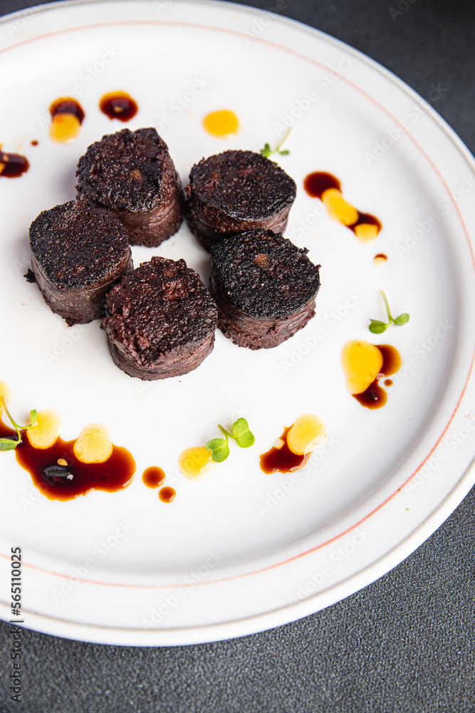 black pudding snack or bloody sausage fresh meal food on the table copy space food background rustic top view black pudding snack or bloody sausage fresh meal food on the table copy space food background rustic top view