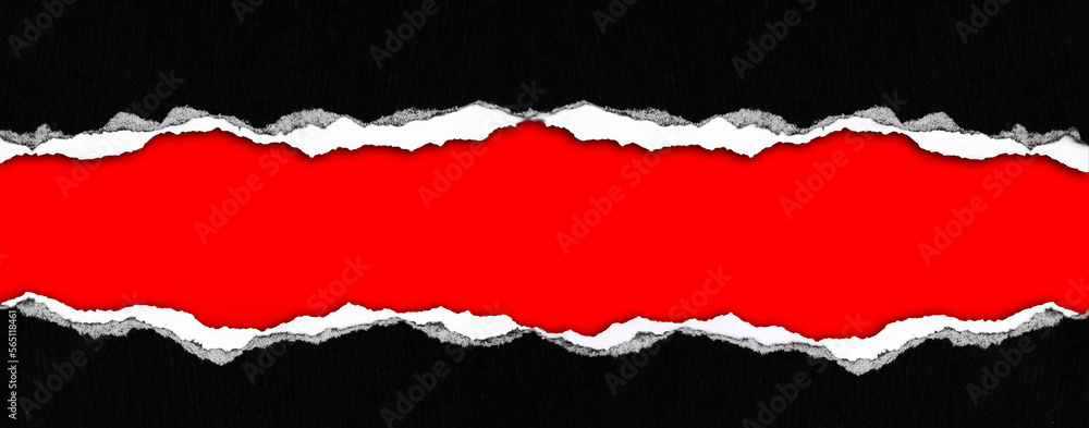 Ripped black paper on red background Ripped black paper on red background