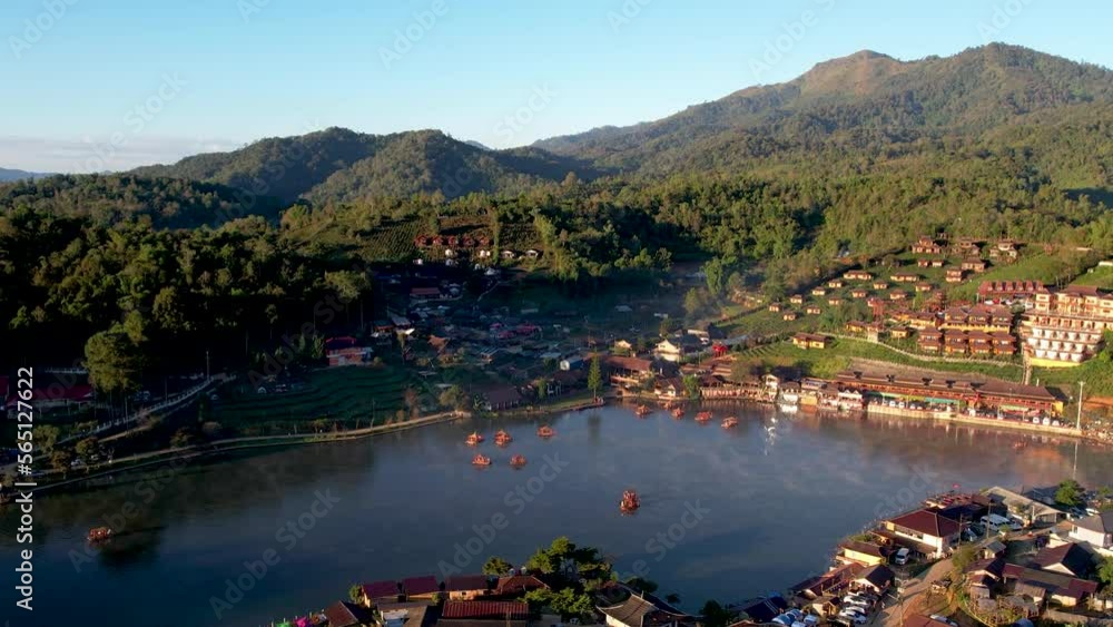 Drone view with fly over lake at Baan Rak Thai village in Mae Hong Son ...