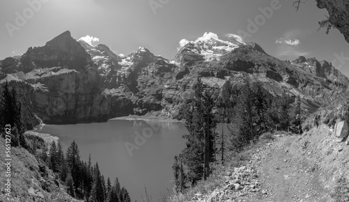 The Oeschinensee lake and the peaks Doldenhorn, Frundenhorn, Oeschinenhorn, Blumlisalphorn Wyssi Frau and Morgenhorn in Bernese alps. photo