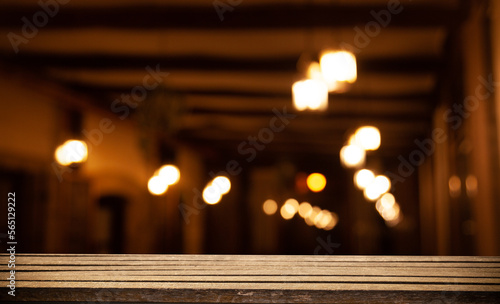 Empty wooden table top for cafeteria, bar, coffee shop background. For product display...