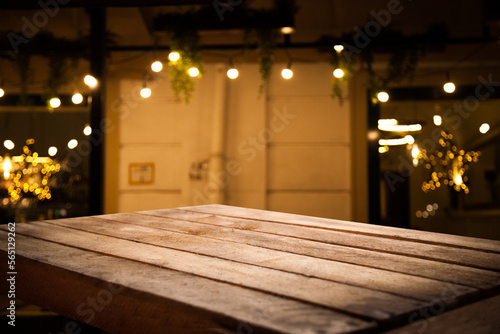 Empty wooden table top for cafeteria  bar  coffee shop background. For product display...