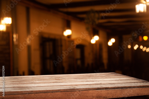 Empty wooden table top for cafeteria  bar  coffee shop background. For product display...