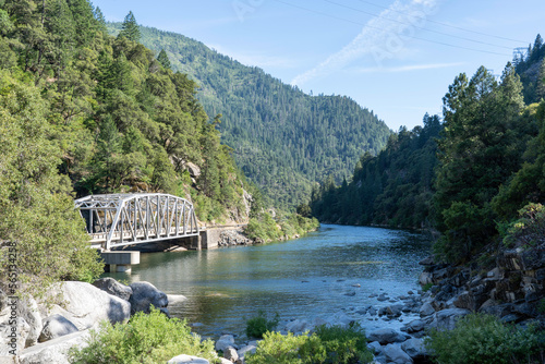 View of the Tobin Ridge Road & Rock Creek with the mountains in background located in the Plumas National Forest, California  photo