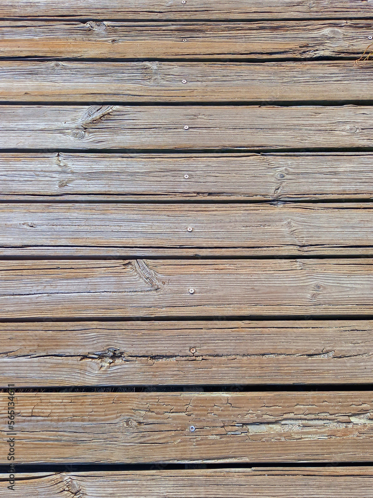 Obraz premium Full frame of horizontal sheets of old wood. Abstract background for design and text. Natural glued spruce board. Detail of the structure of spruce. Texture unpainted pine boards.