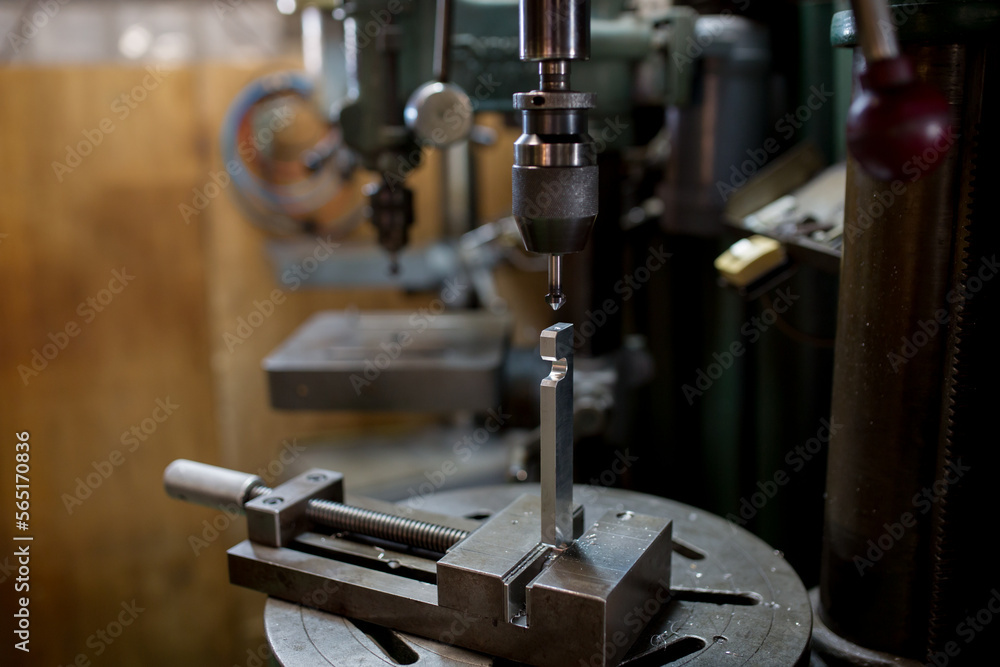 Fototapeta premium Part machining with drilling machine