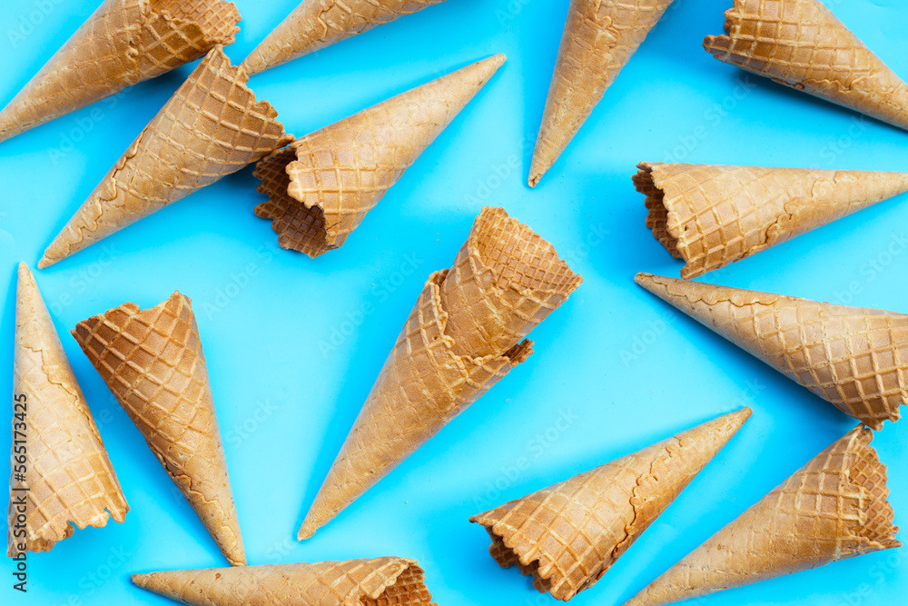 Empty ice cream cone on blue background. Empty ice cream cone on blue background.