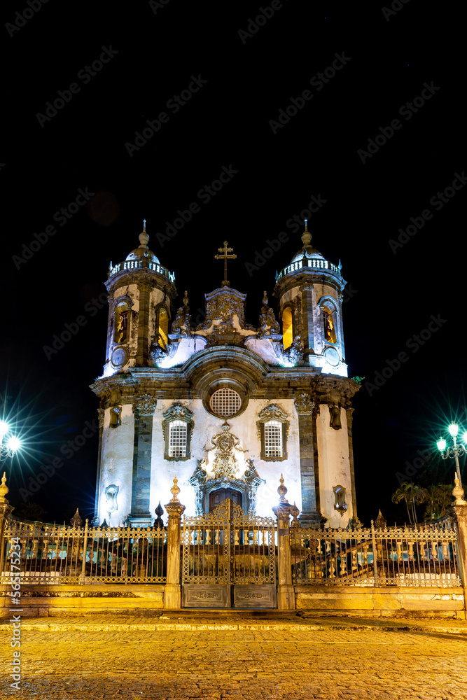 Fototapeta premium Sao Joao del Rei, Minas Gerais, Brazil: Street view inside Sao Francisco de Assis church facade at night