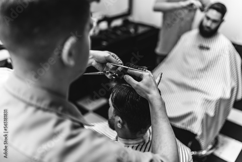 Men's haircut in a barbershop.