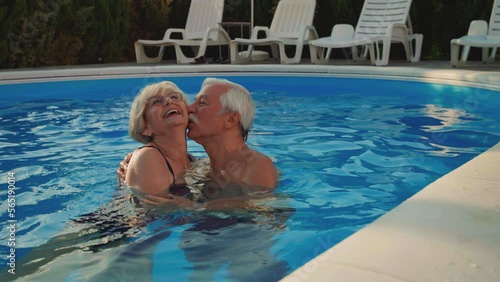 Senior Couple In The Swimming Pool