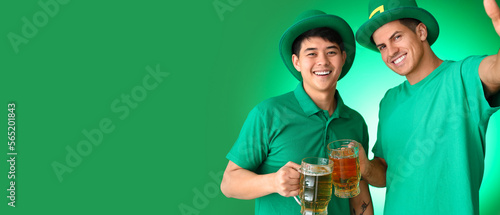 Young men with beer taking ...