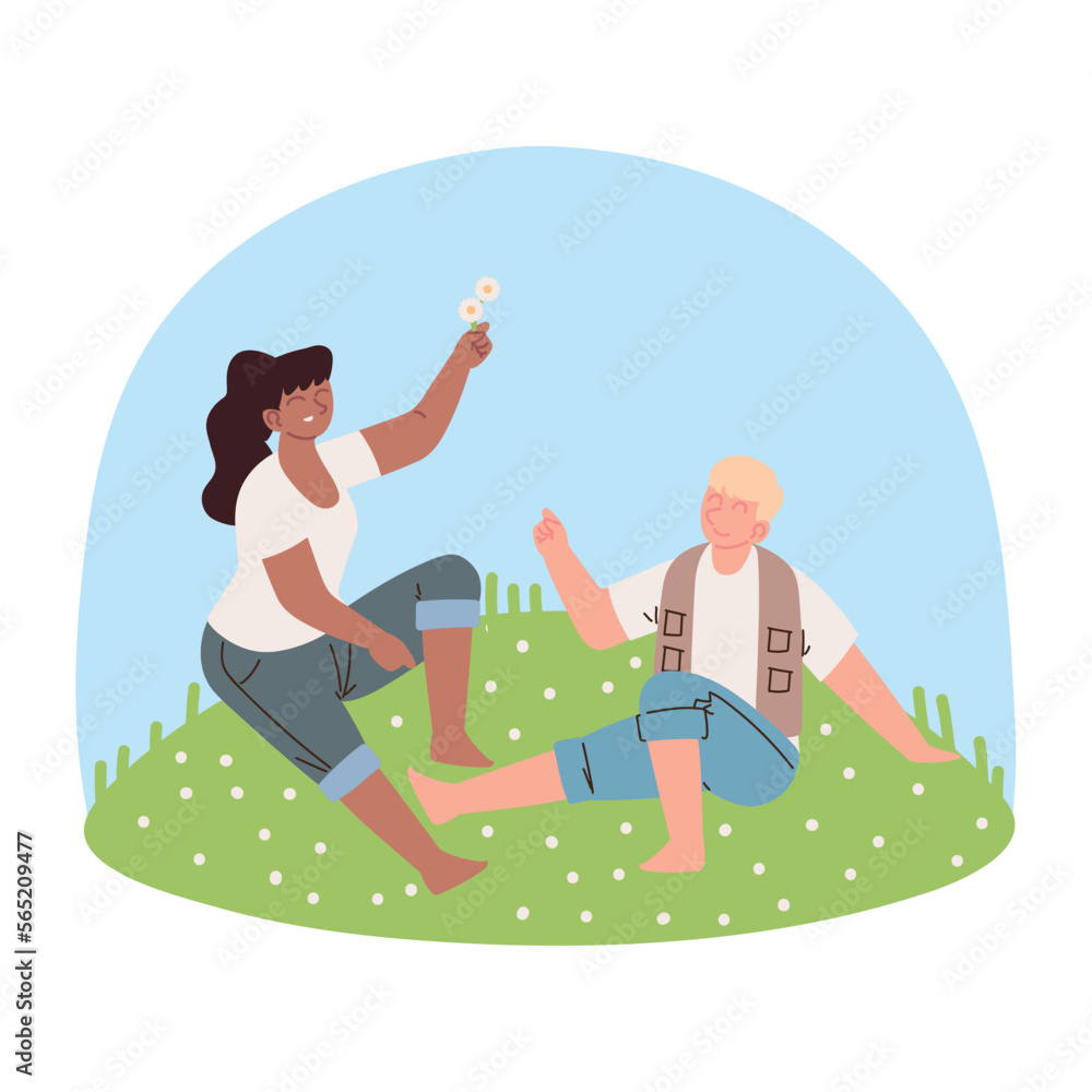 couple on grass with flowers couple on grass with flowers