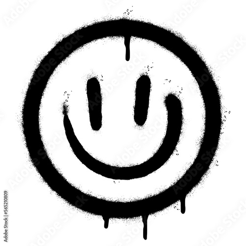 Spray Painted Graffiti smiling face emoticon isolated on white background.