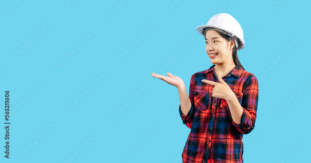 Young asian engineer female standing with open palm posture Young asian engineer female standing with open palm posture
