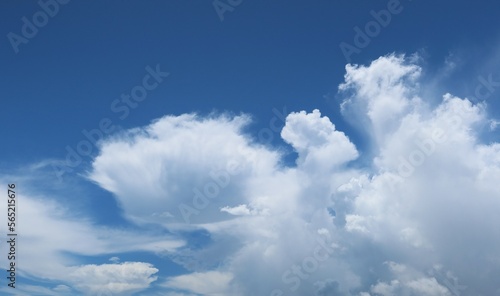 Beautiful view on blue sky with shaped clouds