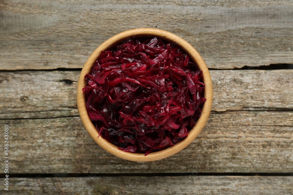 Tasty red cabbage sauerkraut on wooden table, top view Tasty red cabbage sauerkraut on wooden table, top view