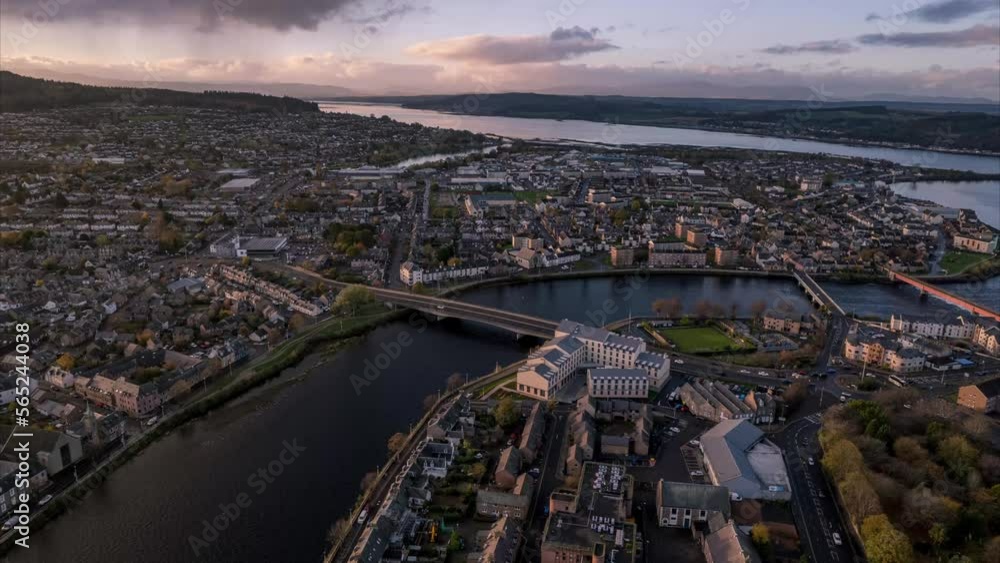 Timelapse aerial shot overhead Inverness with rush hour traffic passing , drone hyperlapse Timelapse aerial shot overhead Inverness with rush hour traffic passing , drone hyperlapse