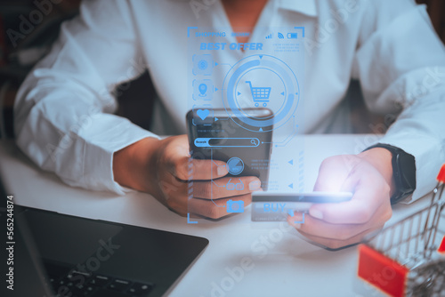 Men using smartphone hand hold credit card pay and online shopping during the promotion.Shop for cheap products from online store. concept on virtual screen with shopping cart, e-commerce, promotion