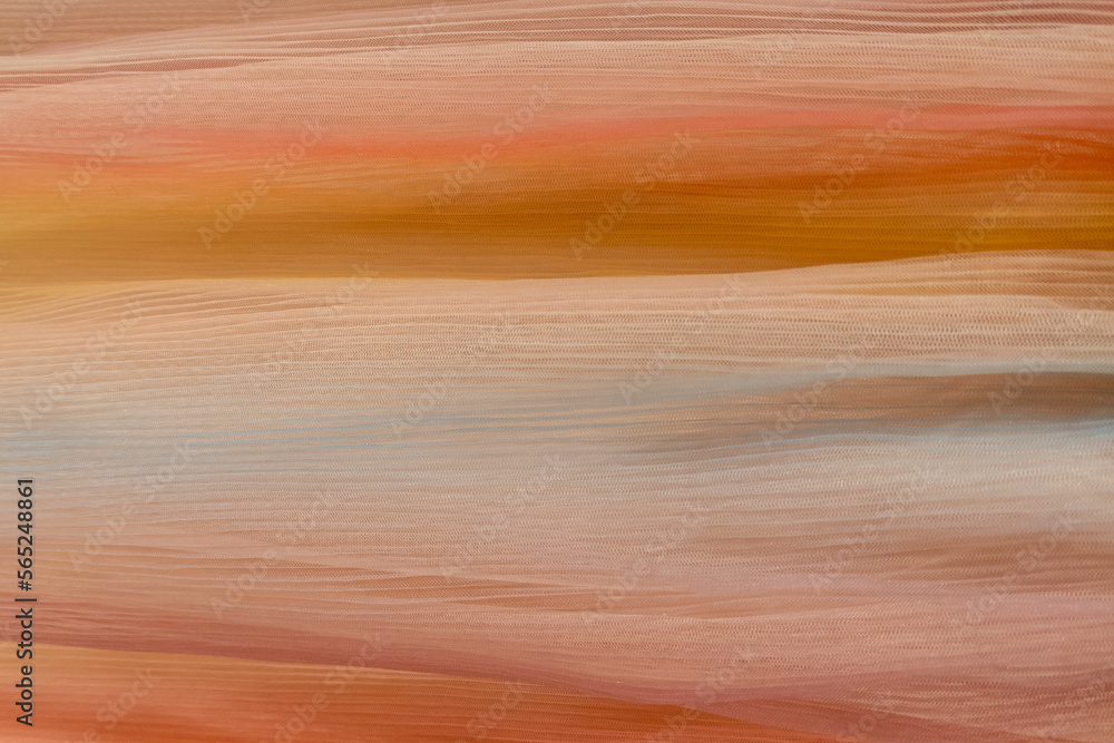 Pale ocher cotton vertical veil of orange fabric canvas background Pale ocher cotton vertical veil of orange fabric canvas background