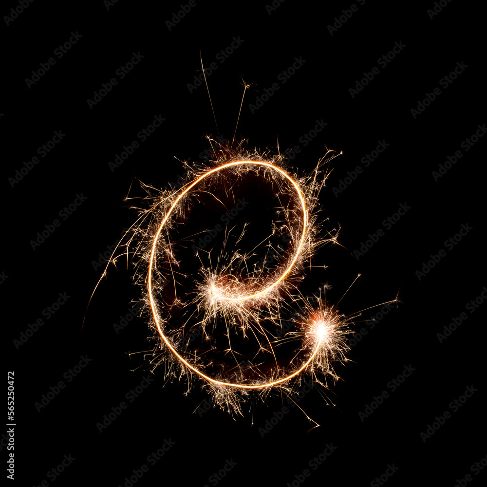 Sparkling burning creative letter E isolated on black background. Beautiful glowing golden overlay object for design holiday greeting card. Creative lettering E written with burning sparklers