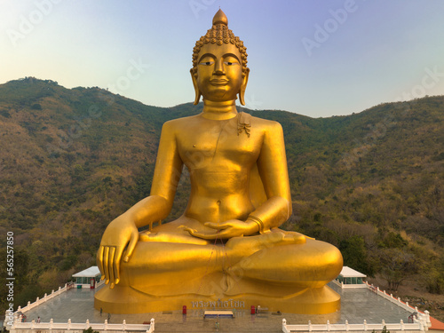 Lopburi, Thailand, Jan 16, 2023, Wat Khao Wong Phrachan, Over 3,700 steps lead up a steep hill to this Buddhist temple with gold statues & a nearby cave. photo