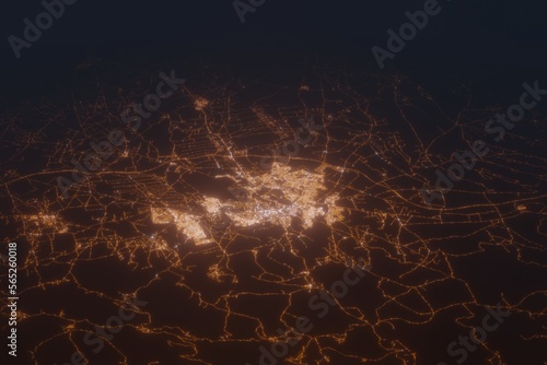 Aerial shot of Meknes (Morocco) at night, view from north. Imitation of satellite view on modern city with street lights and glow effect. 3d render