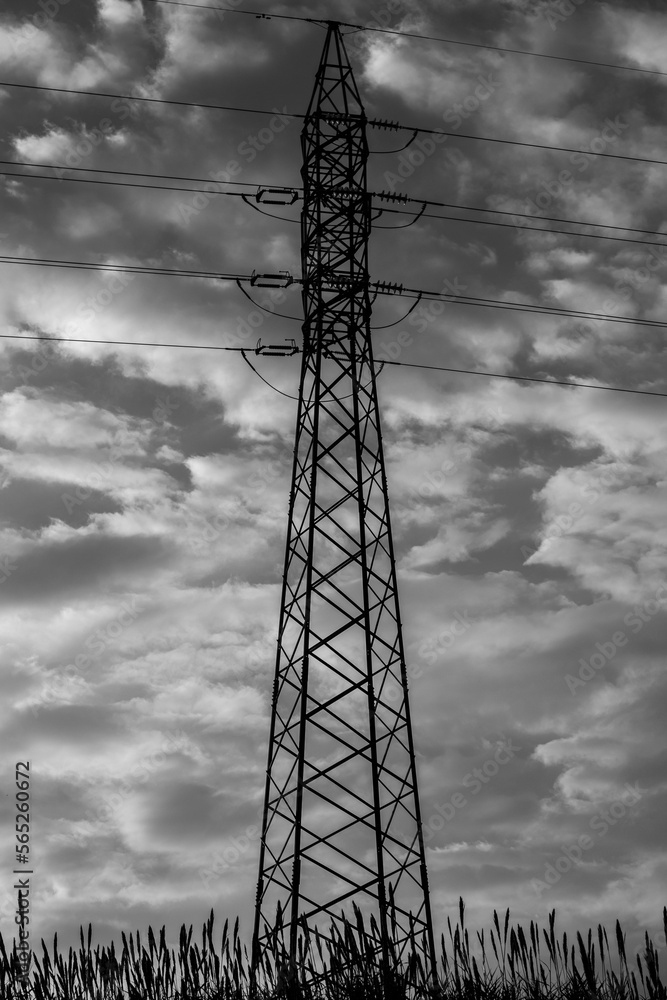 Silhouette of a high voltage cable pylon in the countryside Stock Photo ...