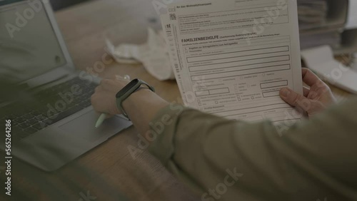 Family allowance form in German language in the hands of a female