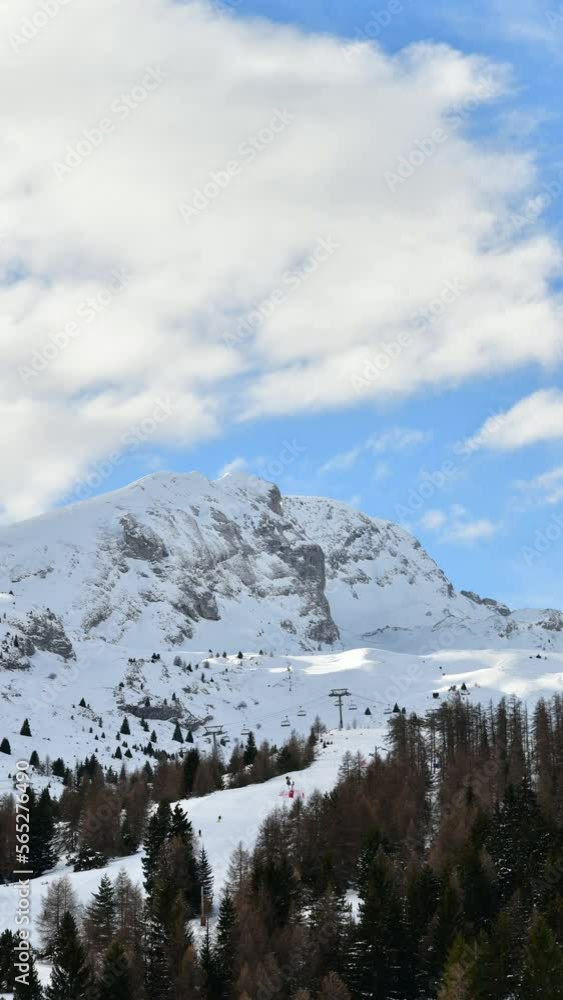 winter mountain landscape, ski resort in the French Alpes, time lapse in vertical winter mountain landscape, ski resort in the French Alpes, time lapse in vertical