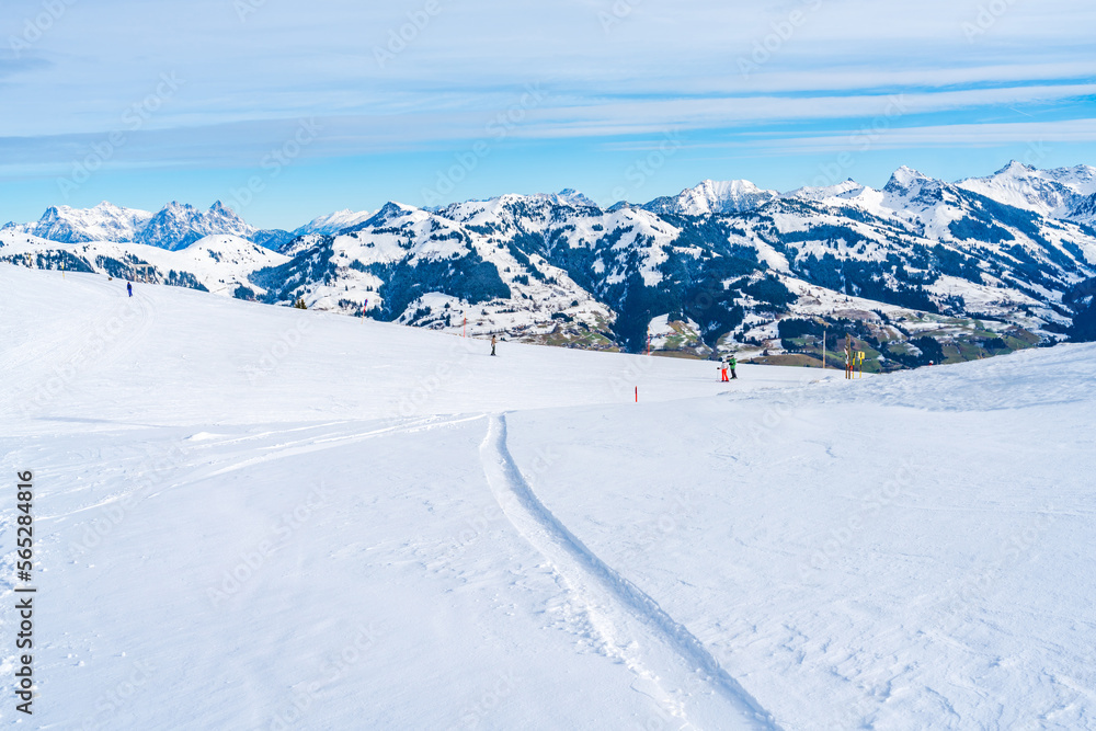 Obraz premium Wintry landscape on Hahnenkamm mountain in Austrian Alps in Kitzbuhel. Winter in Austria