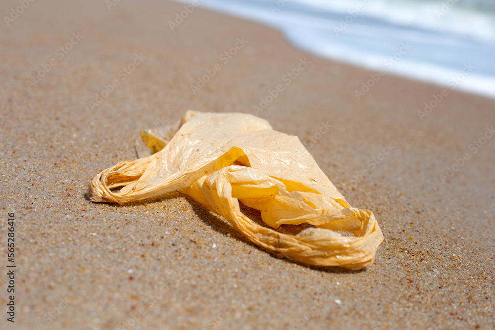 Plastic bag pollution on the beach Plastic bag pollution on the beach