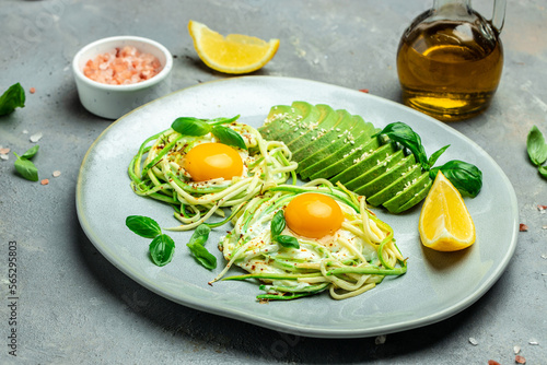zucchini with eggs and avocado. breakfast. Healthy food, ketogenic diet, diet lunch concept. place for text, top view