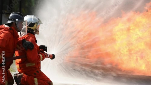 firefighter training new fireman team. Fire fighter learning stop fire burn under emergency case at fire station. rescue service of Emergency Care System of Insurance team.