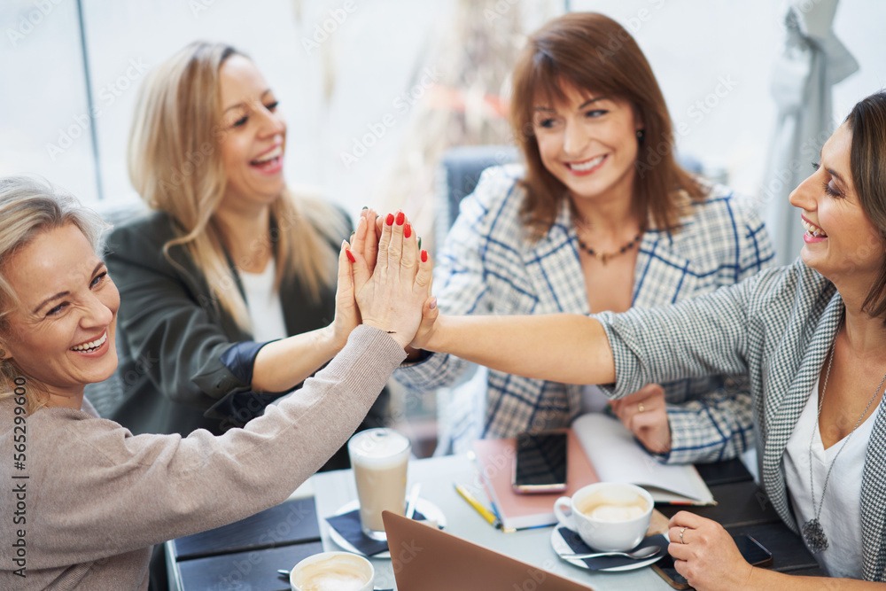 Picture of hands together on business meeting Picture of hands together on business meeting